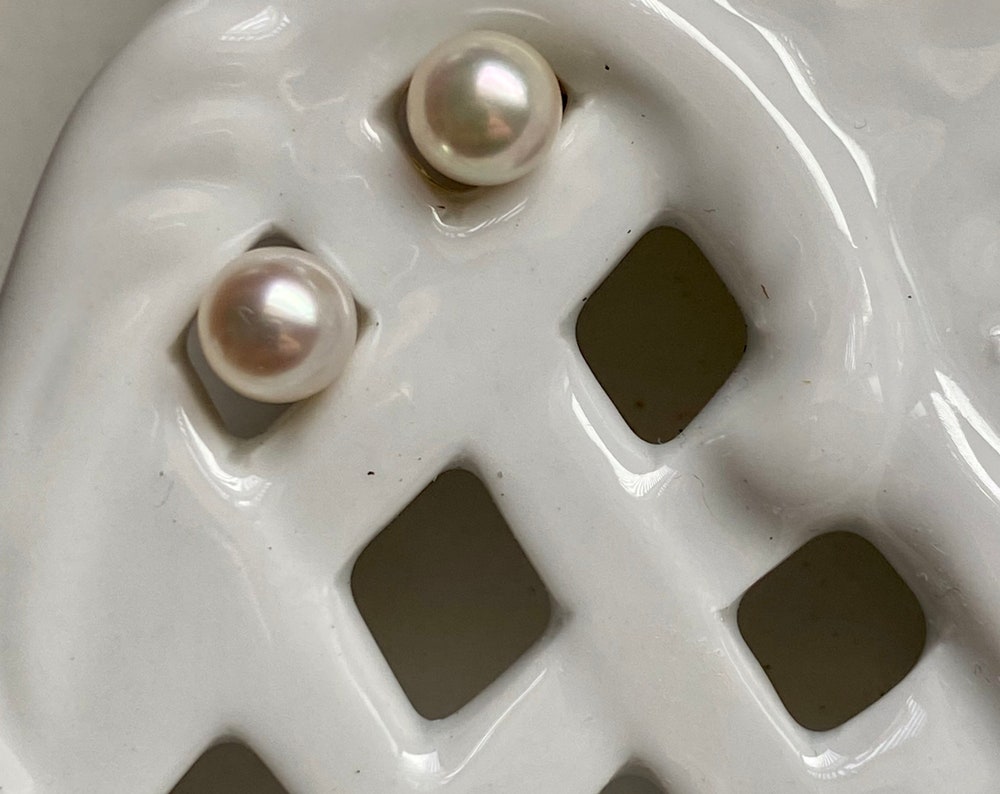 Japanese Akoya pearl stud earrings. 5.6mm iridescent white Saltwater cultured pearls. 14k gold-filled post and ear clutches- Century Pearls